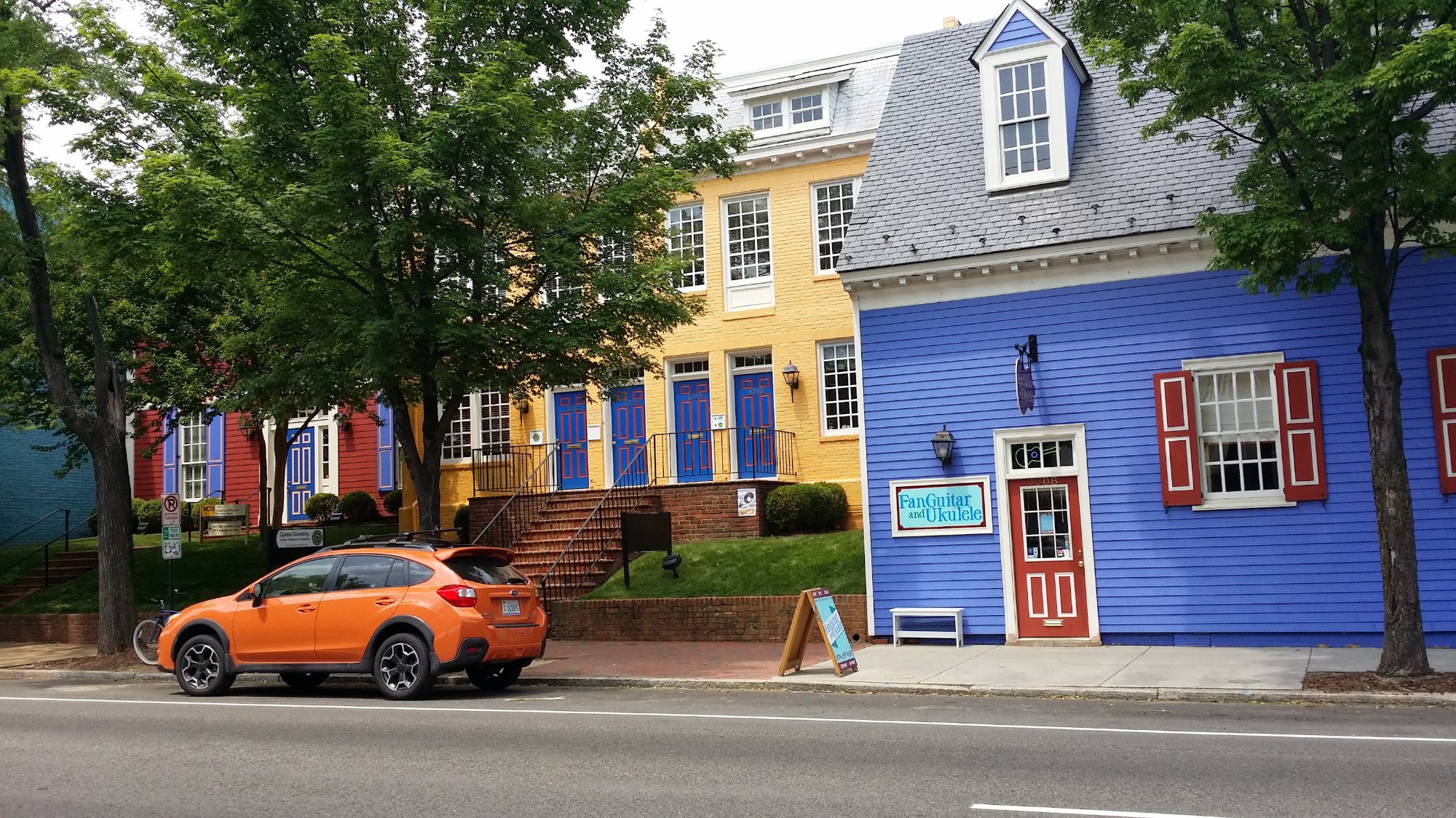 Brightly-painted row-house businesses on Main Street in Richmond, Virginia