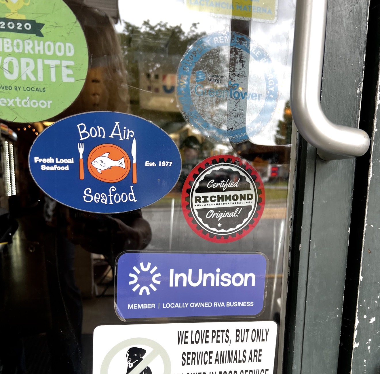 Certified A RICHMOND ORIGINAL badge on the door of Perk Coffee and Lunchbox in Bon Air